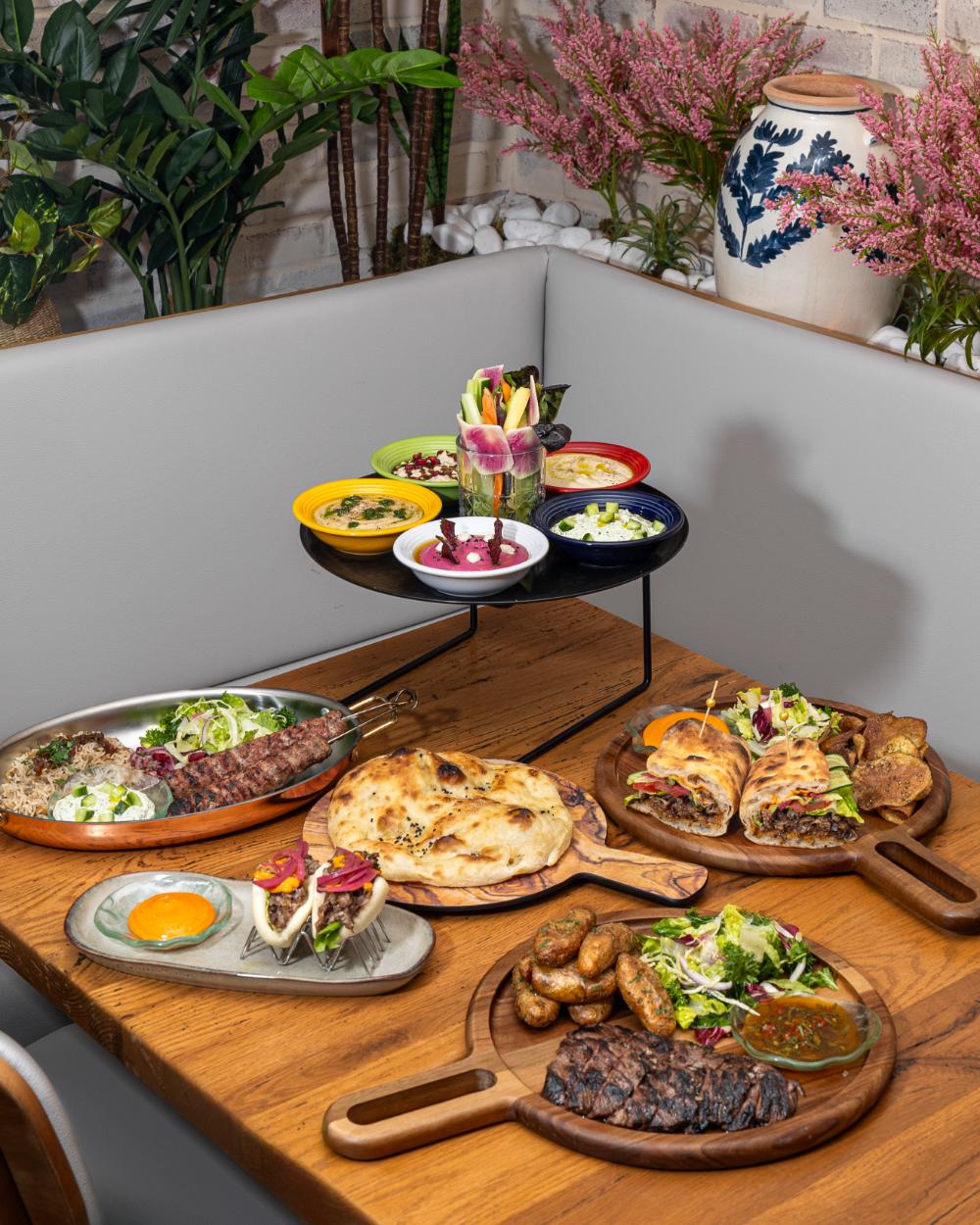 Tiered stand with desserts and drinks