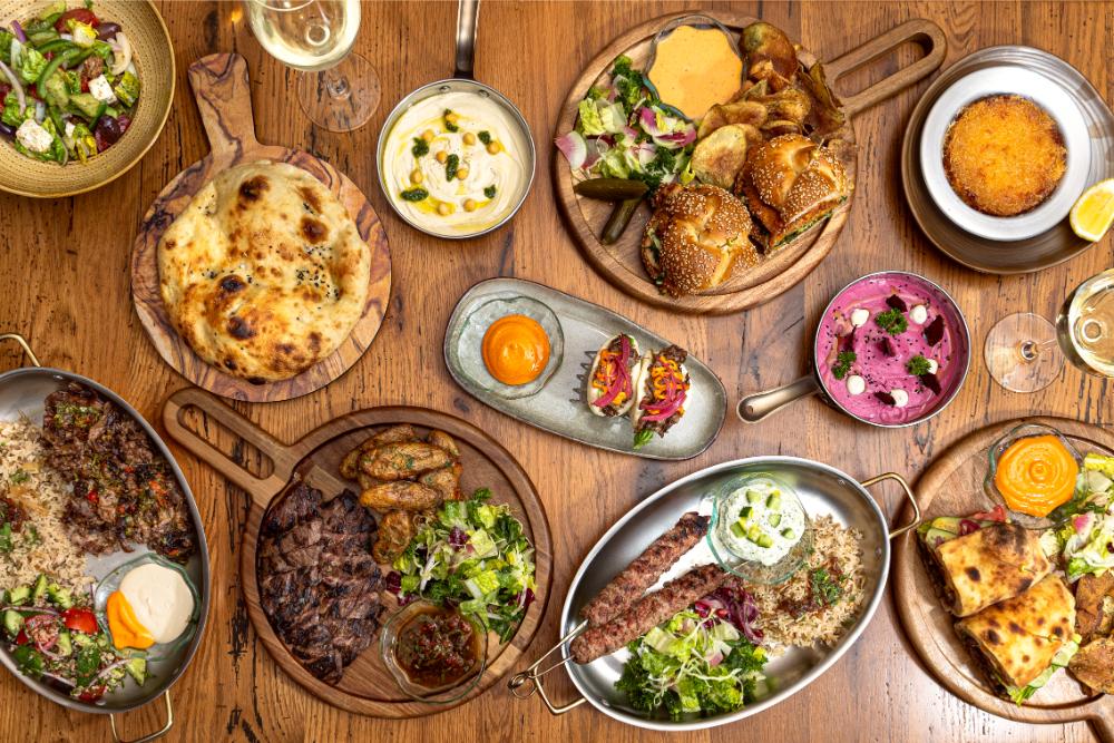 Overhead table filled with sharable plates