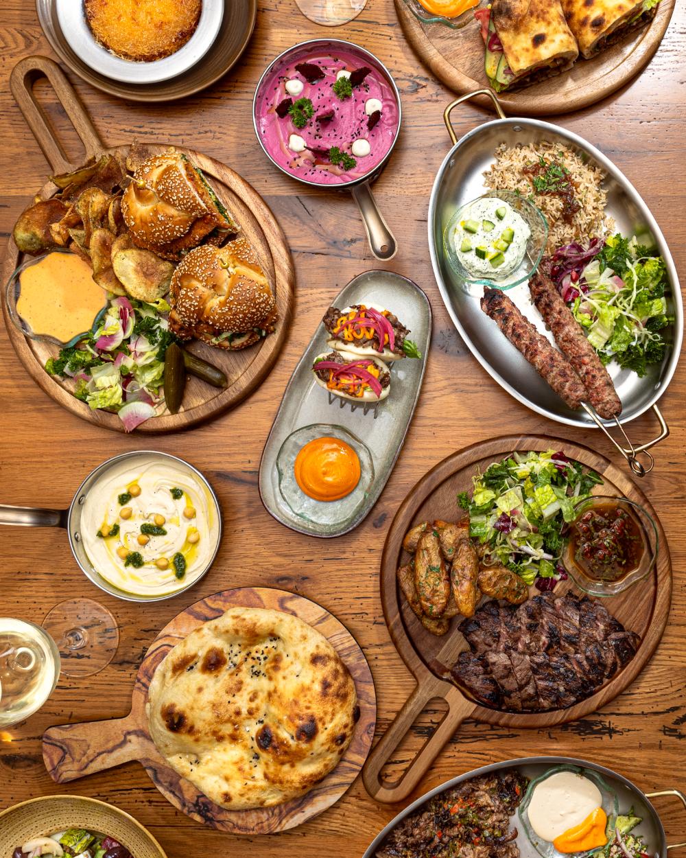 Overhead spread of Mediterranean dishes