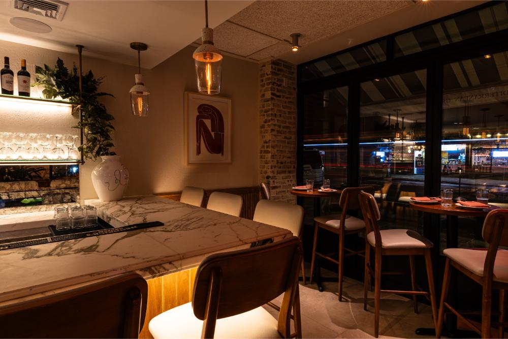 Dining room with warm pendant lighting